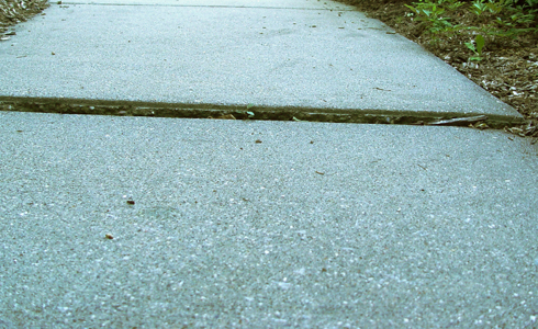 Concrete shifting from rain water.