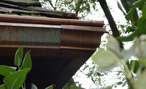 Copper Gutter from All Gutter Systems with patina.