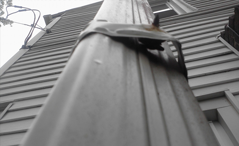 Downspout Damage, repaired by All Gutter Systems
