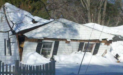 Roof collapse on a residential property.